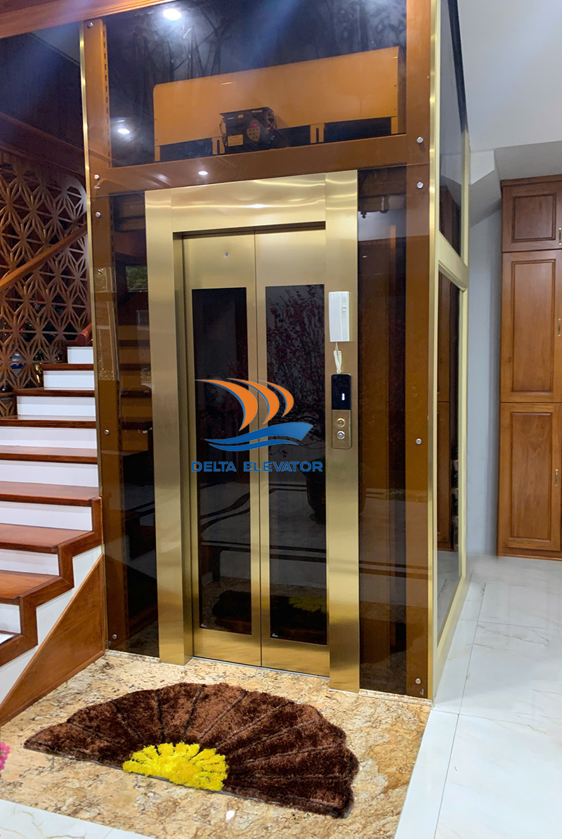 Bàn giao hoàn thiện công trình thang máy inox vàng cao cấp